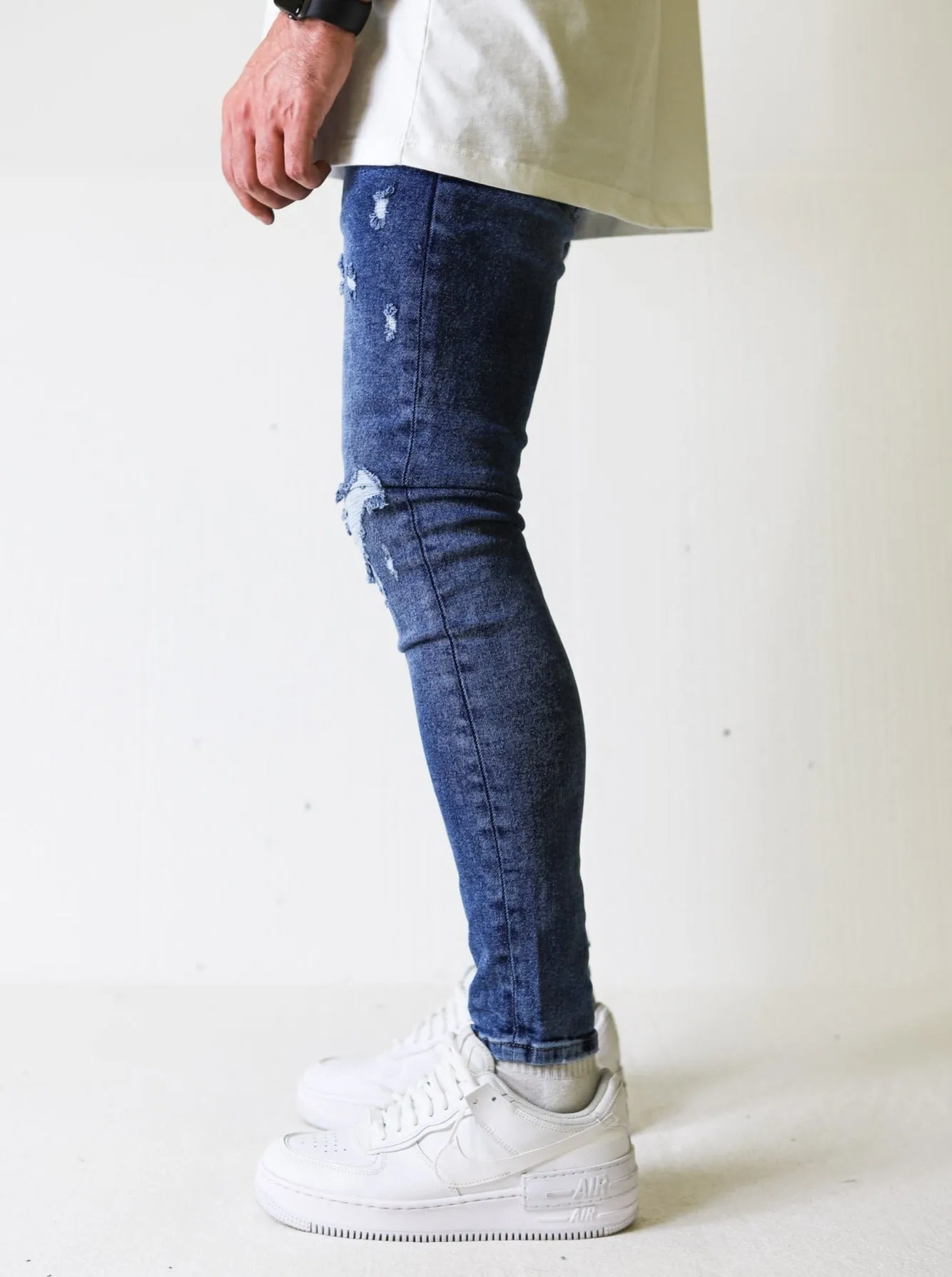 Premium 4X Stretch Claw Ripped Blue Jeans